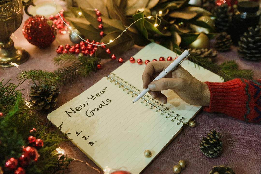 Woman setting kind, realistic new year goals